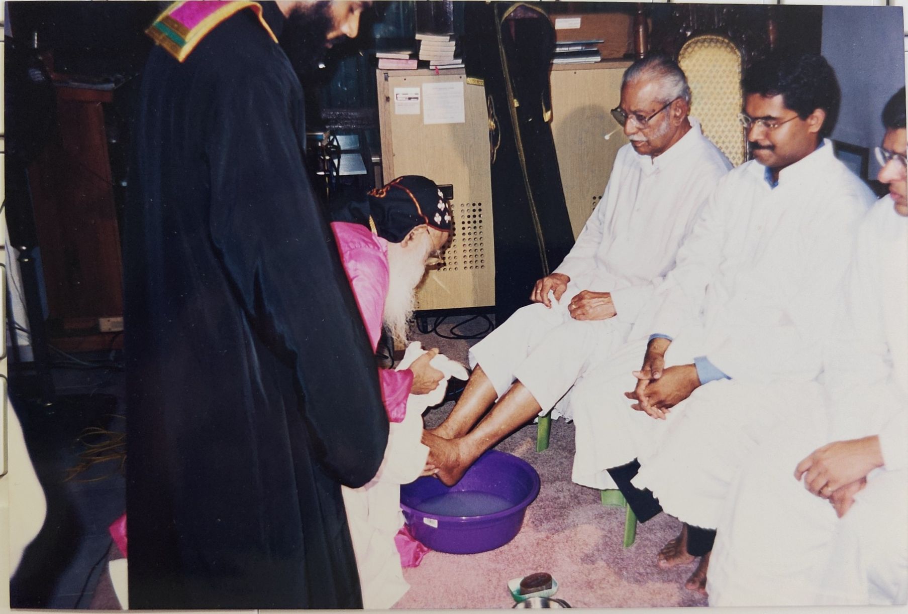 ../_images/FeetWashingWithThirumeni.jpg